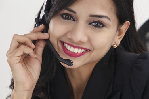 close up of the receptionist smiling,talking