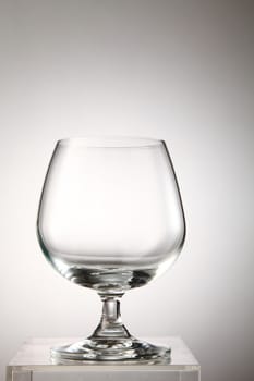 Empty wine glass isolated on white