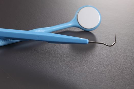Basic dentist tools isolated on gray