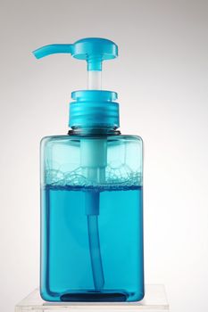 blue color soap in the dispenser