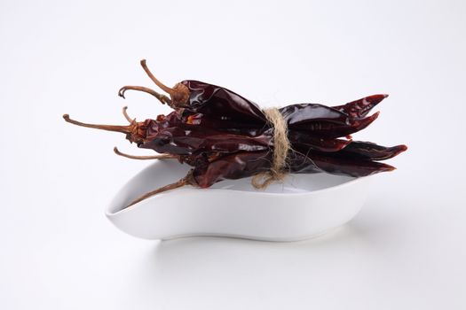 dried chili on the white background