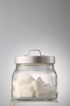 cube sugar in the transparent jar