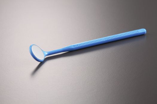 Basic dentist tools isolated on gray