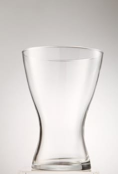 empty transparent body shaped glass on the white background