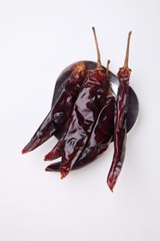 dried chili on the white background