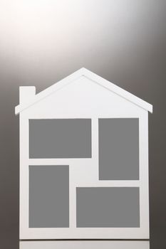 close up house shaped picture frame 