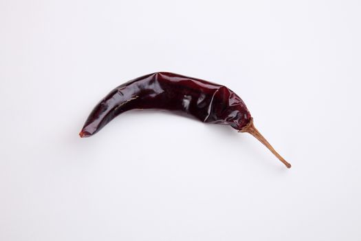 dried chili on the white background