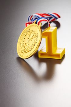 number one and golden medal