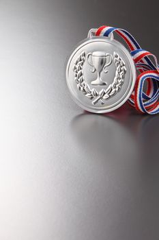 silver medal on the ggray background