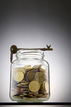 key on top of the saving jar