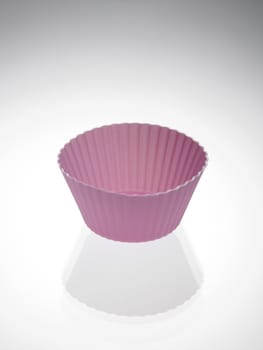 purple cupcake form isolated on white