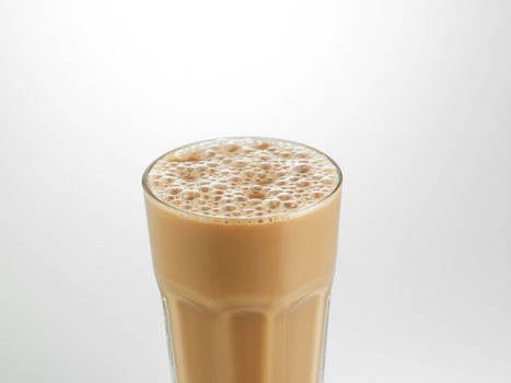 Big glass Tea with milk or Teh Tarik in Malaysia