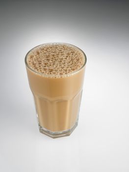 Big glass Tea with milk or Teh Tarik in Malaysia