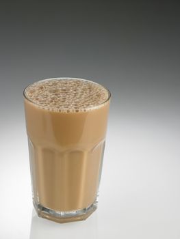 Big glass Tea with milk or Teh Tarik in Malaysia