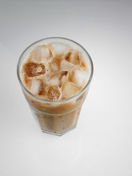 Top view milk tea with ice cube or teh tarik with ice