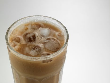 Top view milk tea with ice cube or teh tarik with ice