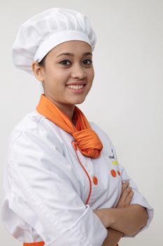 Portrait of a Indian woman with chef uniform with confident