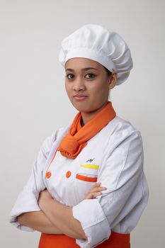 Portrait of a Indian woman with chef uniform with confident