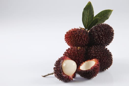 pulasan  thick skin or wild rambutan on the white background