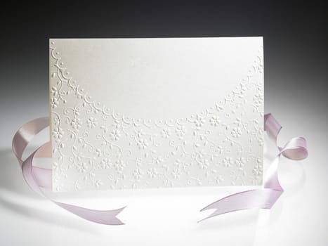 blank greeting card with ribbon