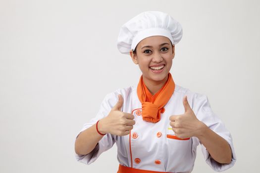 Portrait of a Indian woman with chef uniform