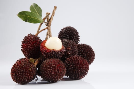 pulasan  thick skin or wild rambutan on the white background