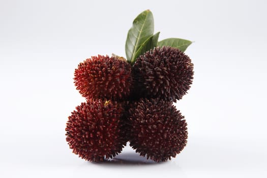 pulasan  thick skin or wild rambutan on the white background