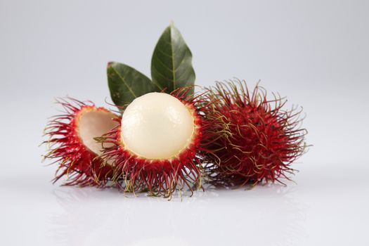 asian fruit rambutan on the plain background