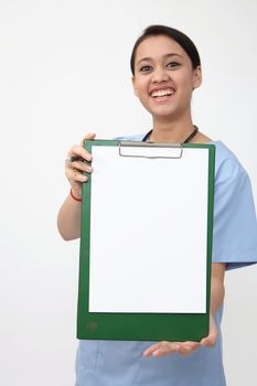 nurse doctor woman smile with stethoscope hold and showing blank clipboard.
