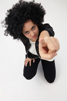 high angle ,indian girl with big afro hair with hand gesture