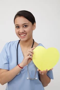 Close up of the nurse holding heart shape