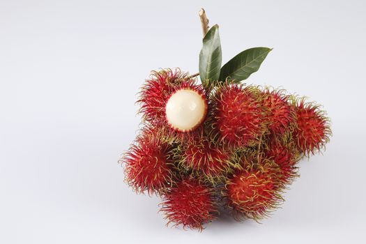 asian fruit rambutan on the plain background