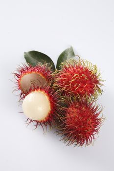 asian fruit rambutan on the plain background