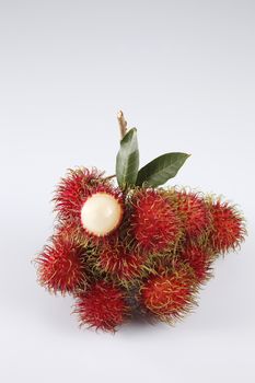 asian fruit rambutan on the plain background