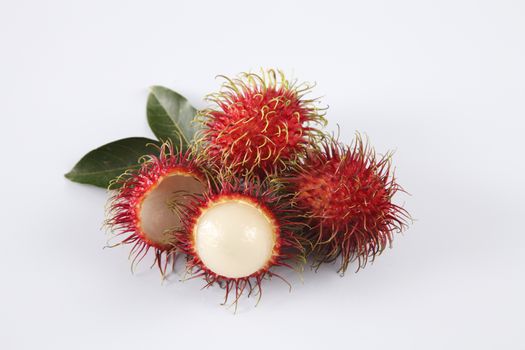 asian fruit rambutan on the plain background