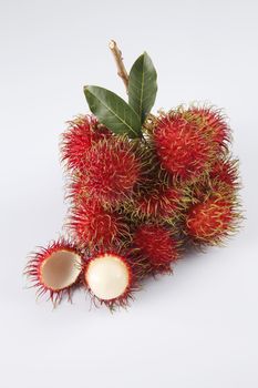 asian fruit rambutan on the plain background