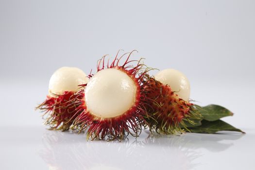 asian fruit rambutan on the plain background