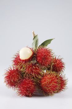 asian fruit rambutan on the plain background