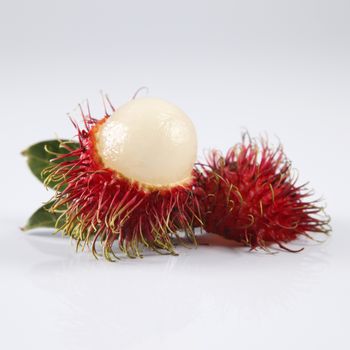 asian fruit rambutan on the plain background