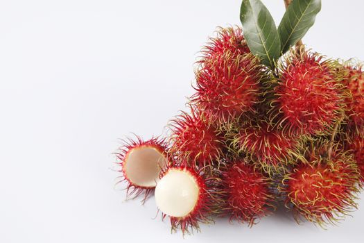 asian fruit rambutan on the plain background