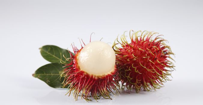 asian fruit rambutan on the plain background