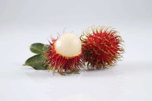 asian fruit rambutan on the plain background