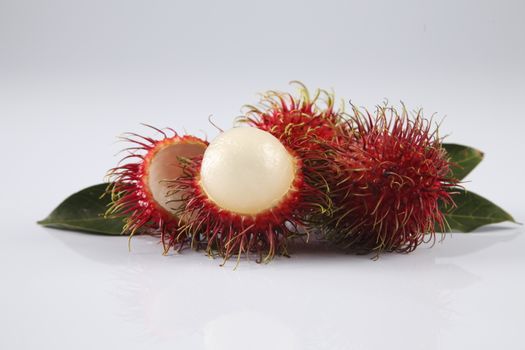 asian fruit rambutan on the plain background