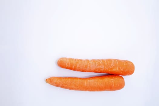 top view of fresh carrot on the white background