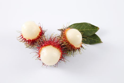 asian fruit rambutan on the plain background