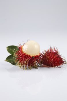 asian fruit rambutan on the plain background