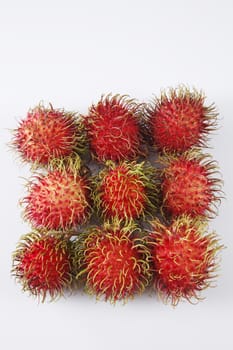 asian fruit rambutan on the plain background