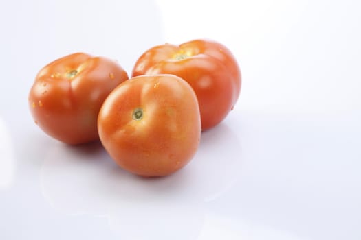 tomatoes on the white backgrond