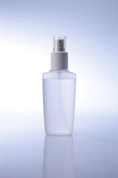 White container of spray bottle isolated over white background