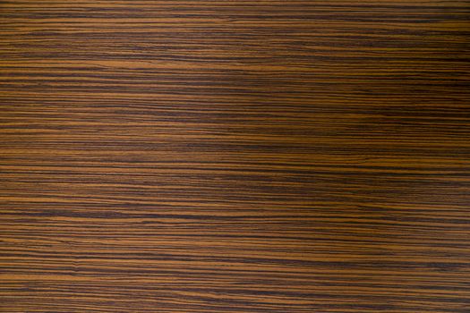 Zebrawood design of brown and black striped color on a laminated table top.
